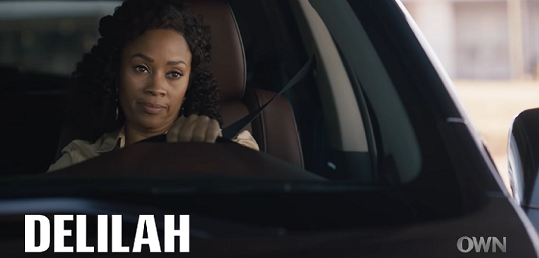 an actress driving a car in the tv show Delilah