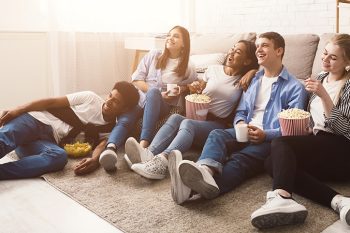 Group of friends watching TV
