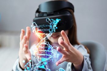 schoolgirl using virtual reality goggles to learn